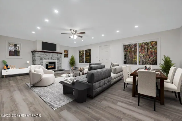 a kitchen with stainless steel appliances a sink stove and microwave