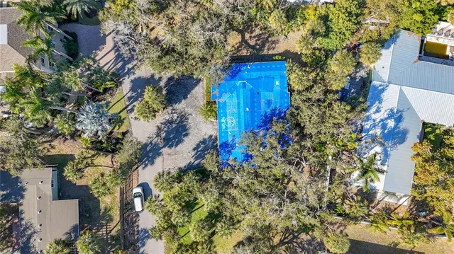 a view of an empty room with windows