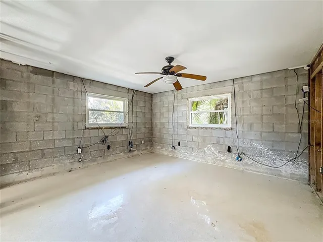 a view of an empty room with a window