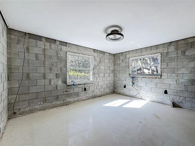 a view of livingroom with furniture and windows