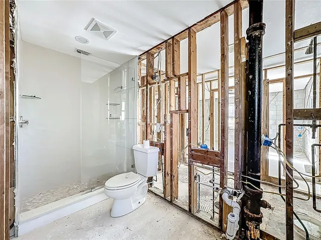 a bathroom with a sink and mirror