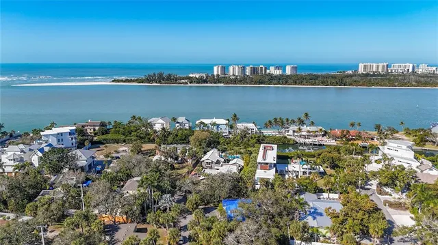 a view of a house with a tree