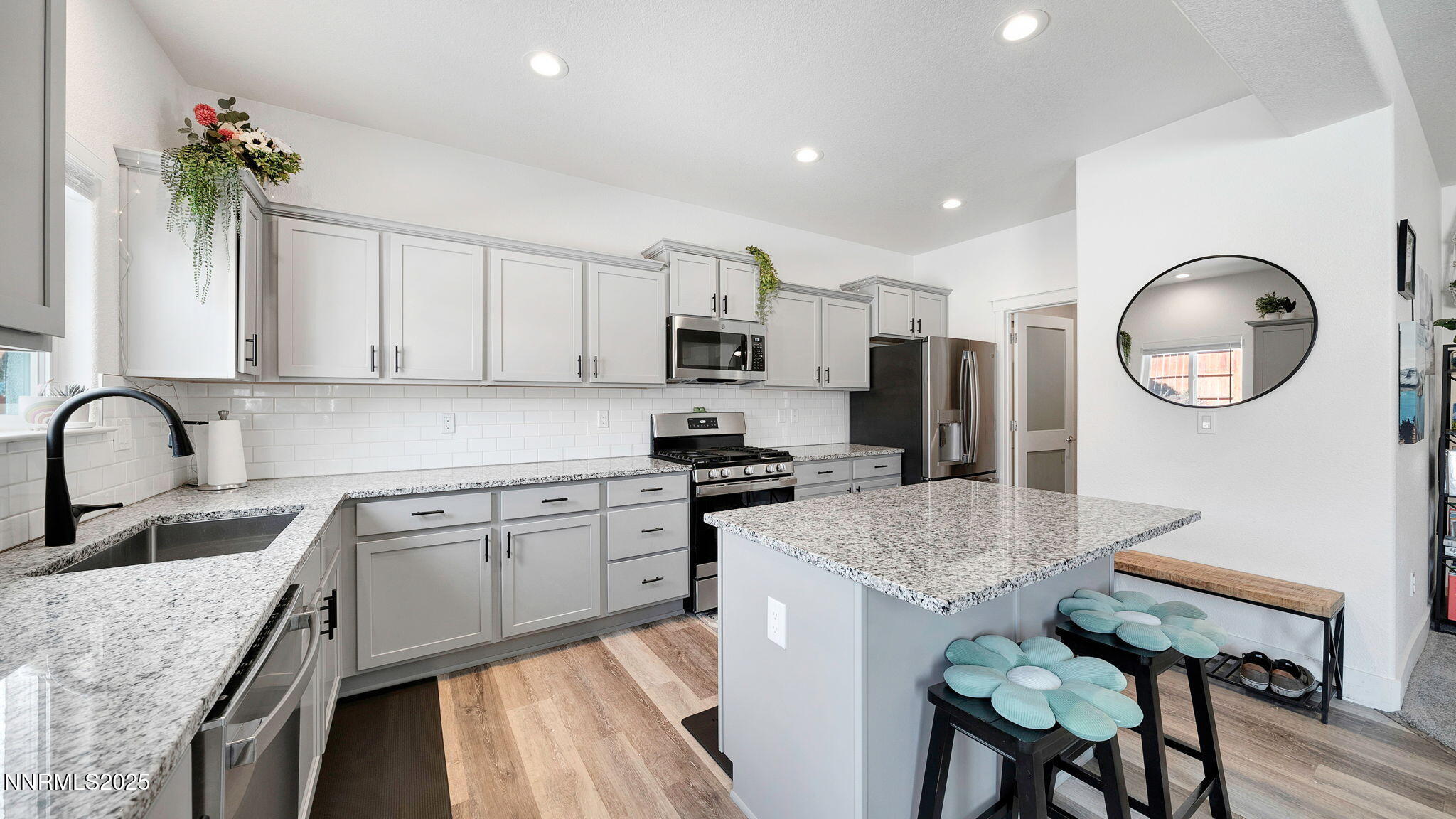 17821 Rose Meadow Court Reno, NV 89508 - Photo 14 of 39 a kitchen with granite countertop a sink stainless steel appliances and cabinets