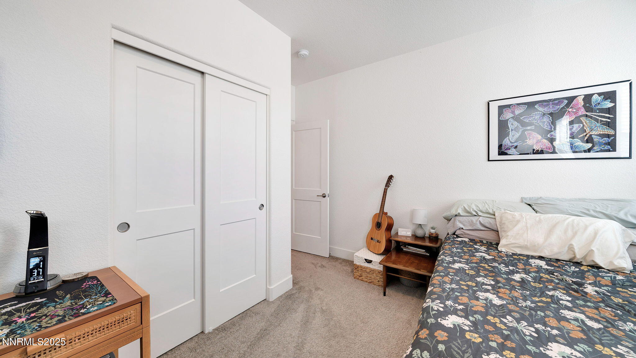 17821 Rose Meadow Court Reno, NV 89508 - Photo 23 of 39 a bed room with furniture and a window