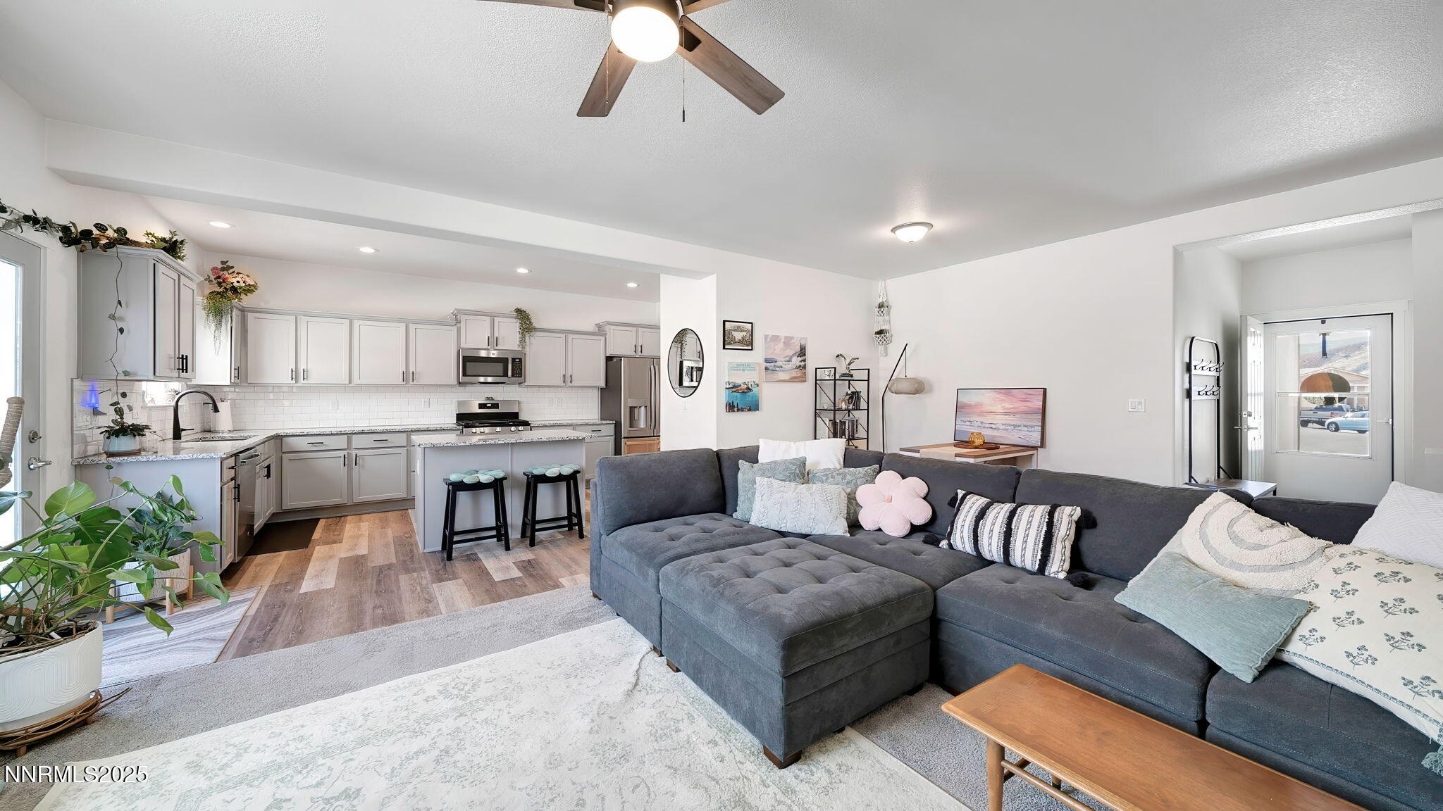 17821 Rose Meadow Court Reno, NV 89508 - Photo 8 of 39 a living room with furniture and kitchen view