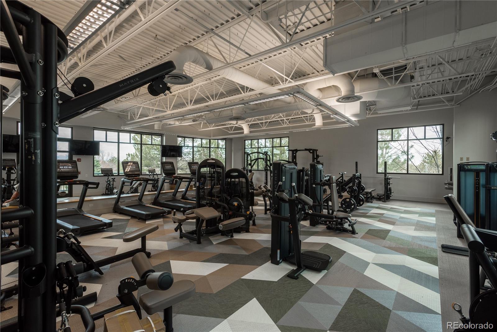8558 Gold Peak Lane, Unit B Highlands Ranch, CO 80130 - Photo 35 of 41 a view of a room with gym equipment