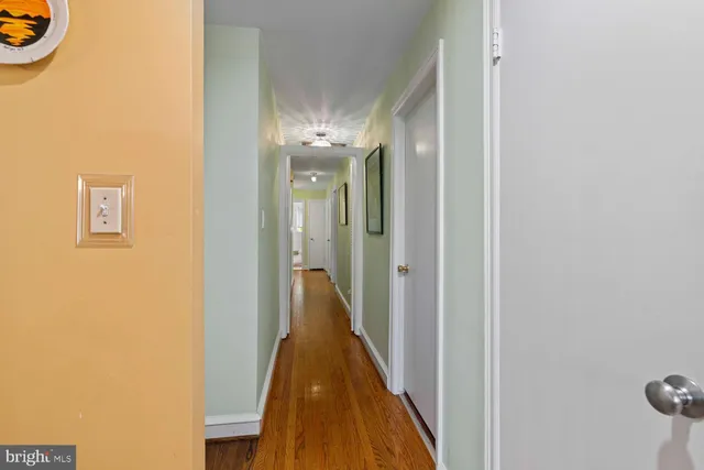 a view of a bathroom from the hallway