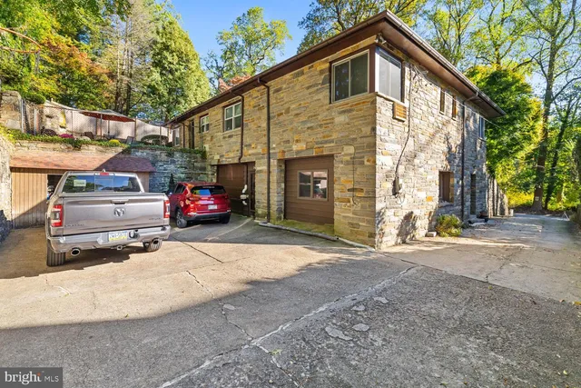 a car parked in front of a house