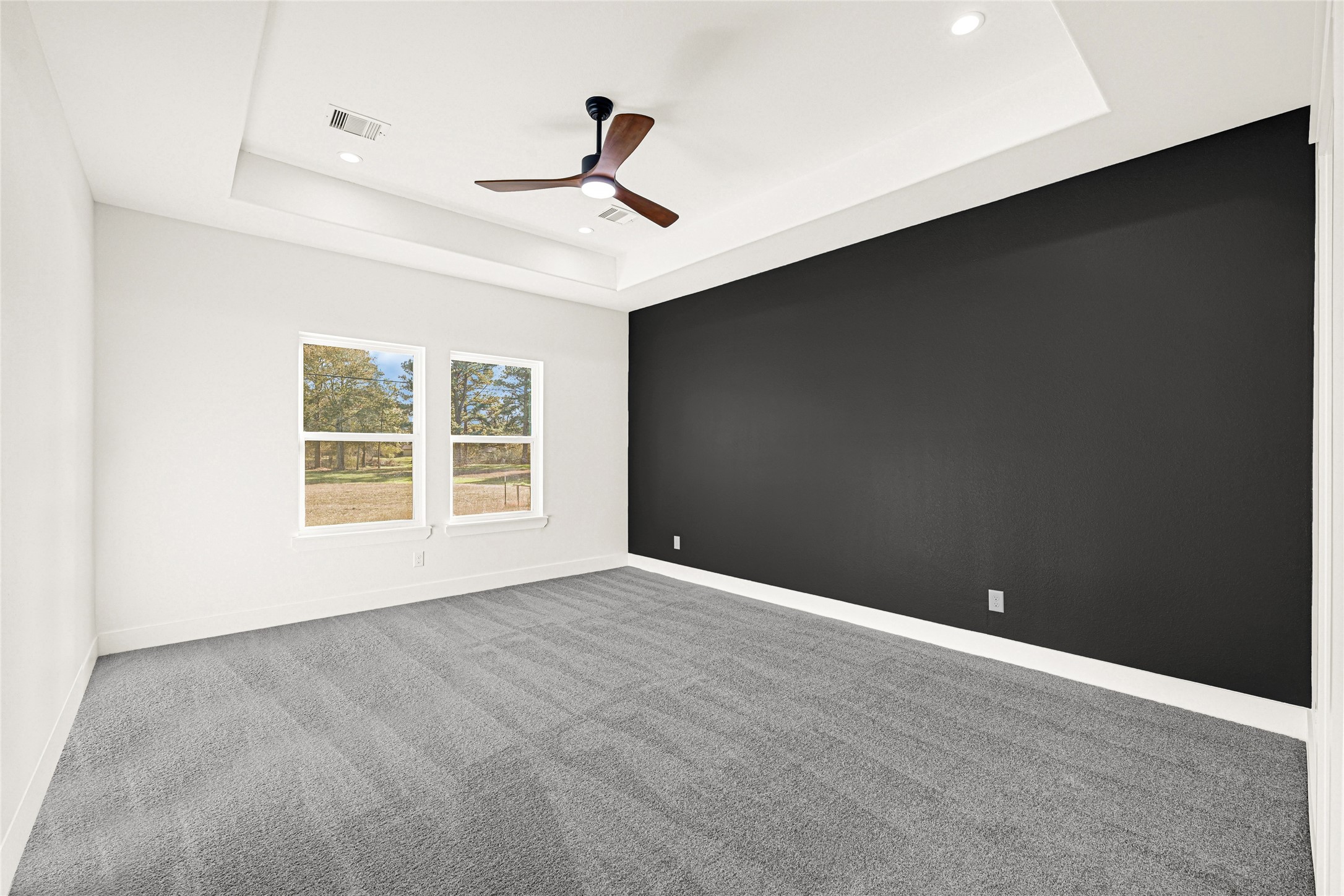 105 Bledsoe Street Prairie View, TX 77446 - Photo 18 of 35 Primary bedroom features 10' tray ceiling