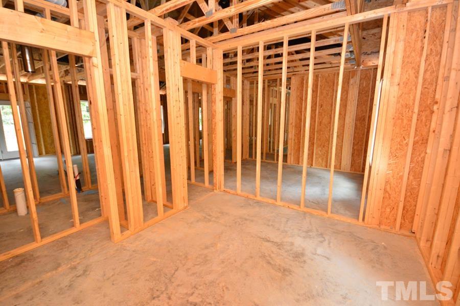 811 Ned Moore Road Timberlake, NC 27583 - Photo 26 of 33 a view of an empty room with stairs
