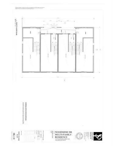 a black and white photo of a white wall