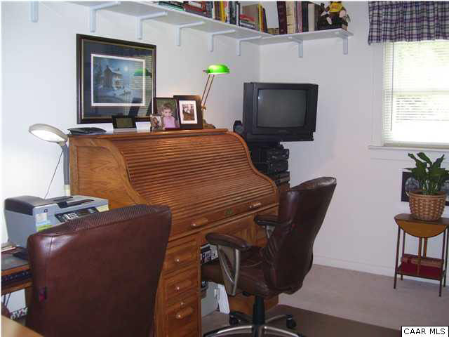 182 Childs Road Stanardsville, VA 22973 - Photo 12 of 27 a bedroom with furniture and a window