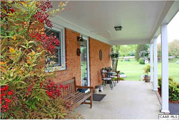 182 Childs Road Stanardsville, VA 22973 - Photo 5 of 27 a outdoor living space with furniture and garden view