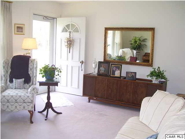 182 Childs Road Stanardsville, VA 22973 - Photo 7 of 27 a living room with furniture and a window
