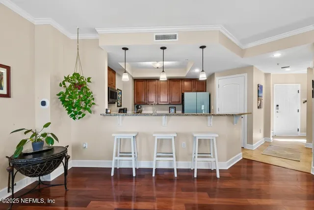 a bedroom with a bed and cabinets