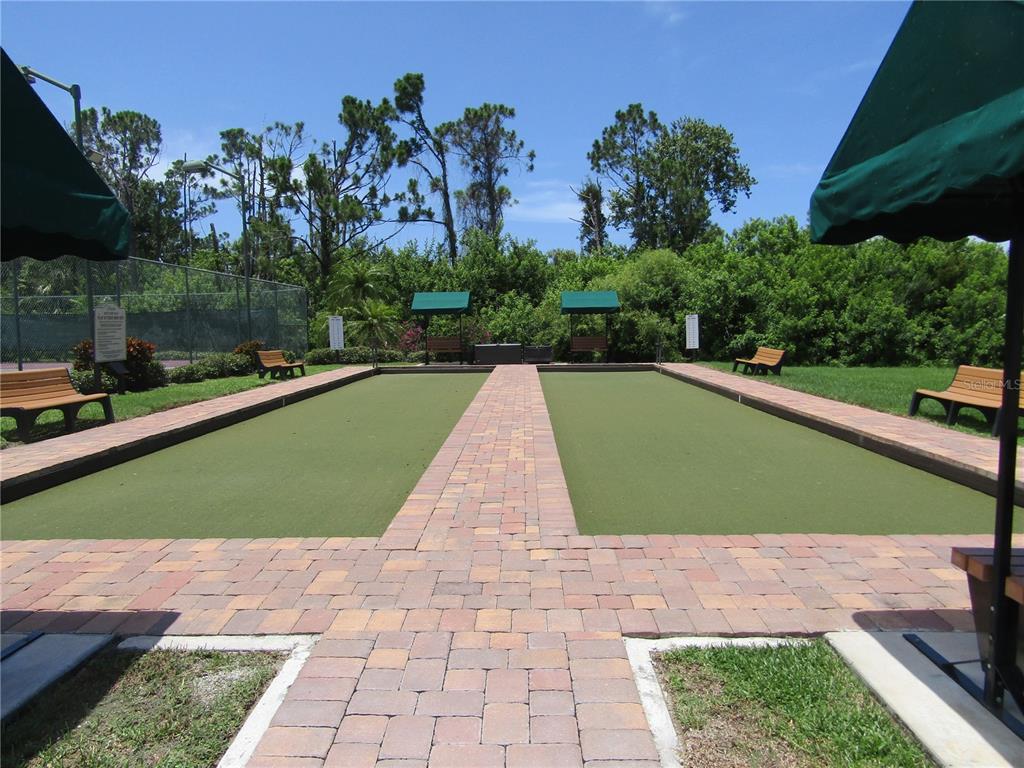 4137 Bella Pasque Venice, FL 34293 - Photo 30 of 30 a view of a yard next to a building
