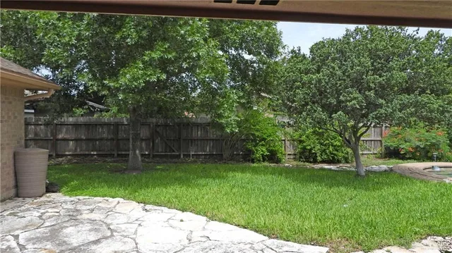 a view of a backyard with a garden