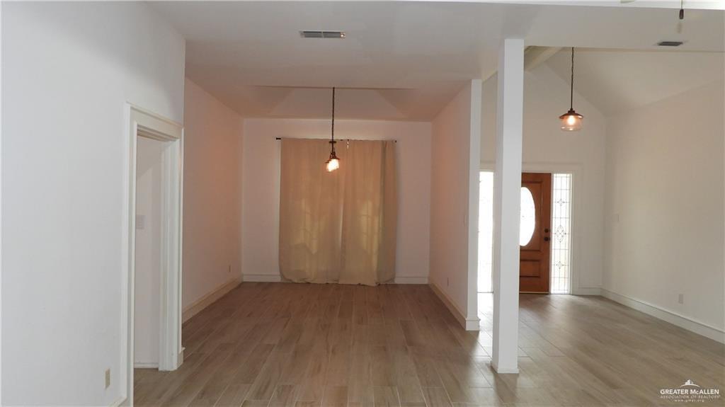 2301 Anacua Circle Edinburg, TX 78539 - Photo 3 of 12 a view of a hallway with wooden floor