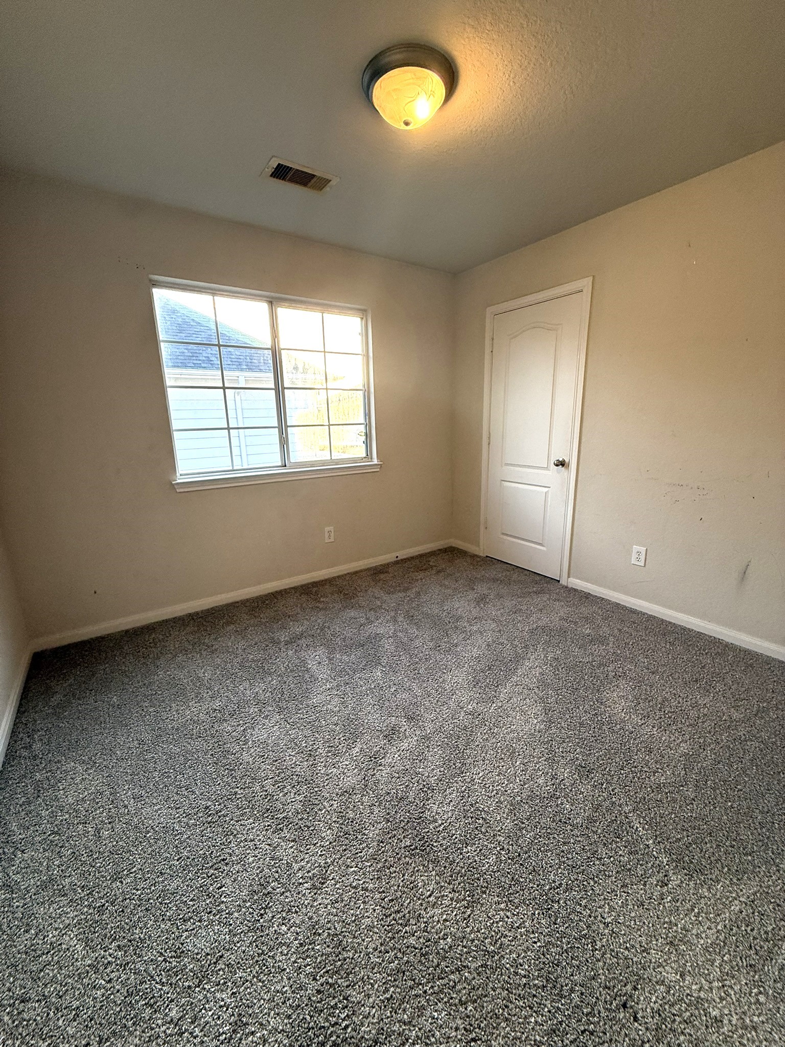 9429 Lambright Road Houston, TX 77075 - Photo 29 of 40 Bedroom #2 is the closest from the staircase. It's the coldest and coziest and offers a full size 8x3 closet.