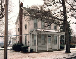 front view of a house with a street