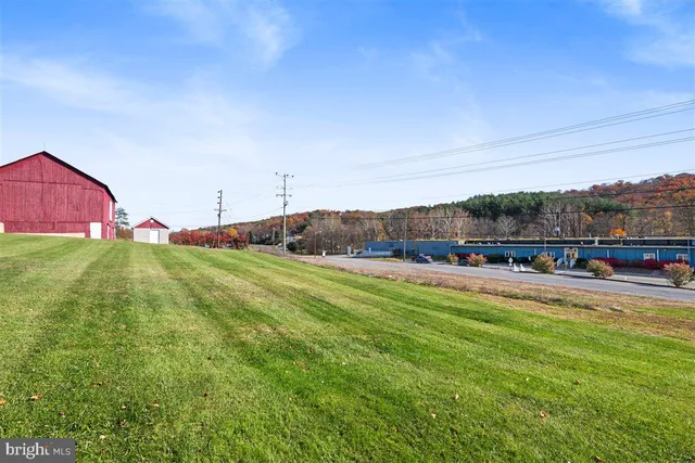 a view of a road with an outdoor space
