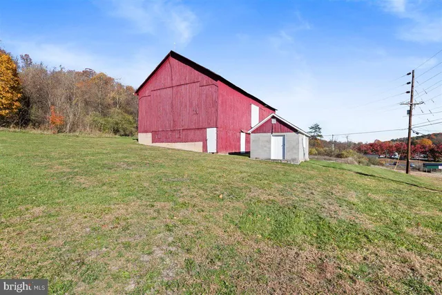 a view of a backyard of the house