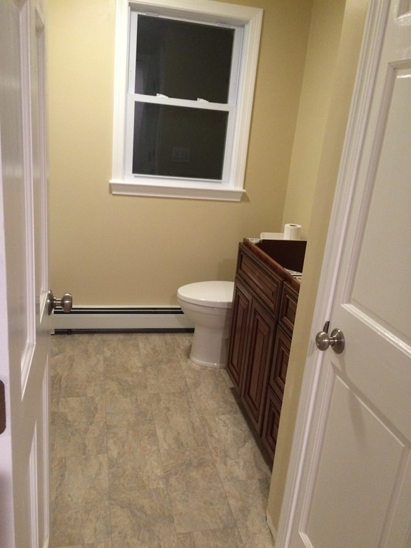 4 Susan Circle Norton, MA 02766 - Photo 18 of 22 a bathroom with a sink and a toilet