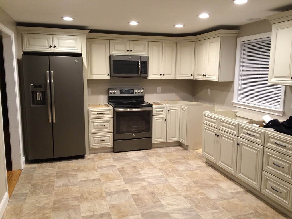 4 Susan Circle Norton, MA 02766 - Photo 20 of 22 a kitchen with stainless steel appliances granite countertop a refrigerator stove and sink