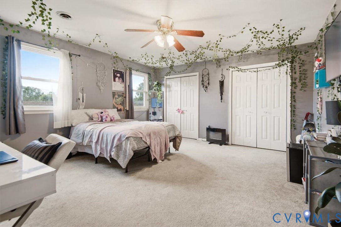 4508 Ridgecrest Lane Colonial Heights, VA 23834 - Photo 33 of 52 Carpeted room featuring multiple windows, two bi-f