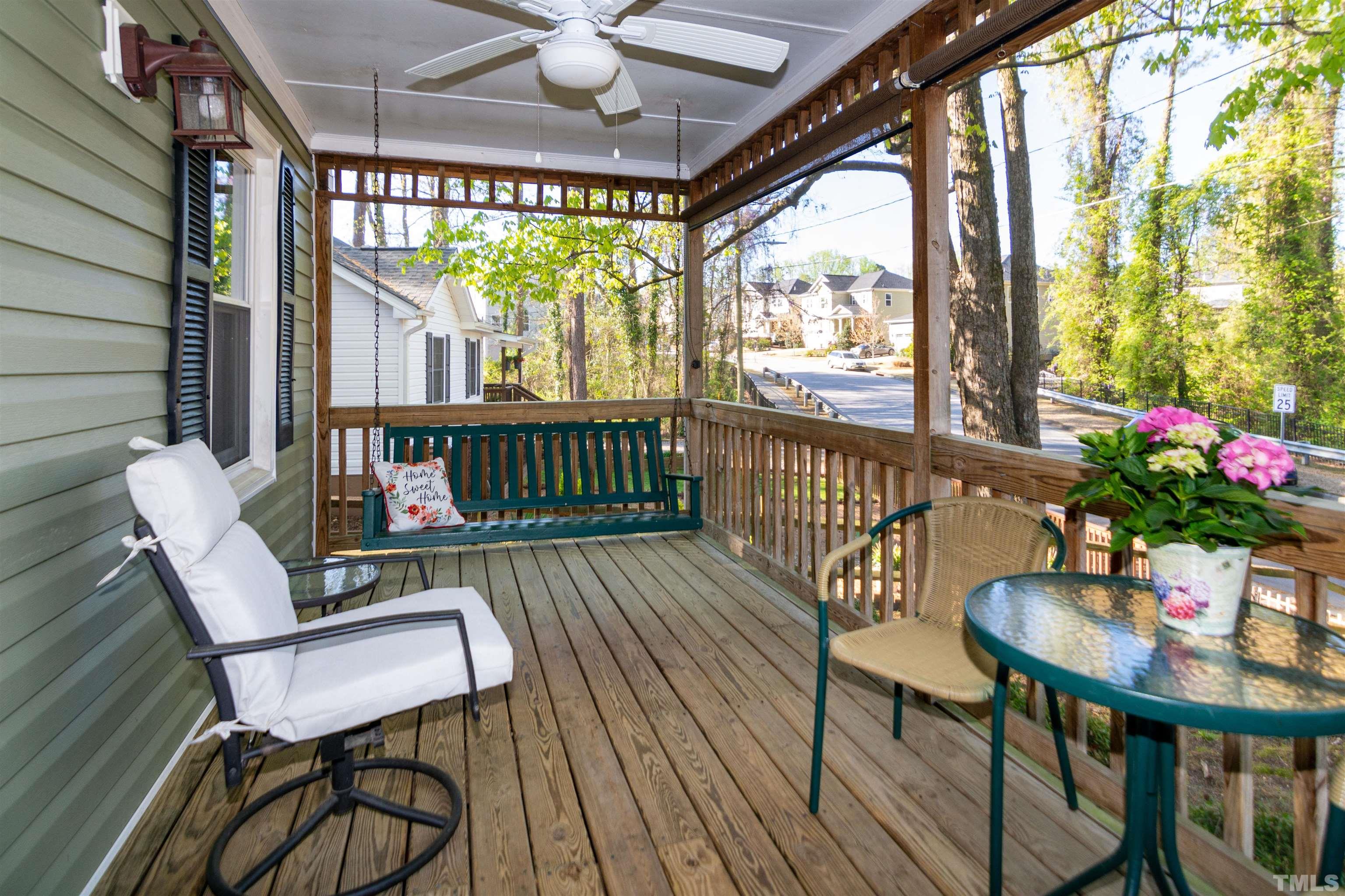 405 Plainview Avenue Raleigh, NC 27604 - Photo 3 of 58 a view of a porch with furniture and a yard