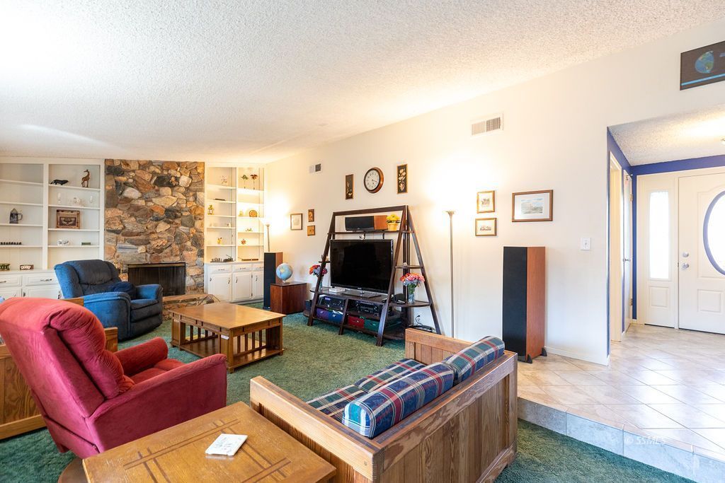 737 Scott Circle Ridgecrest, CA 93555 - Photo 6 of 49 a living room with furniture and a flat screen tv