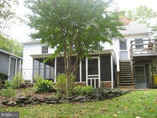 123 North Longcross Road Linthicum, MD 21090 - Photo 3 of 22 a view of a house with a yard and plants