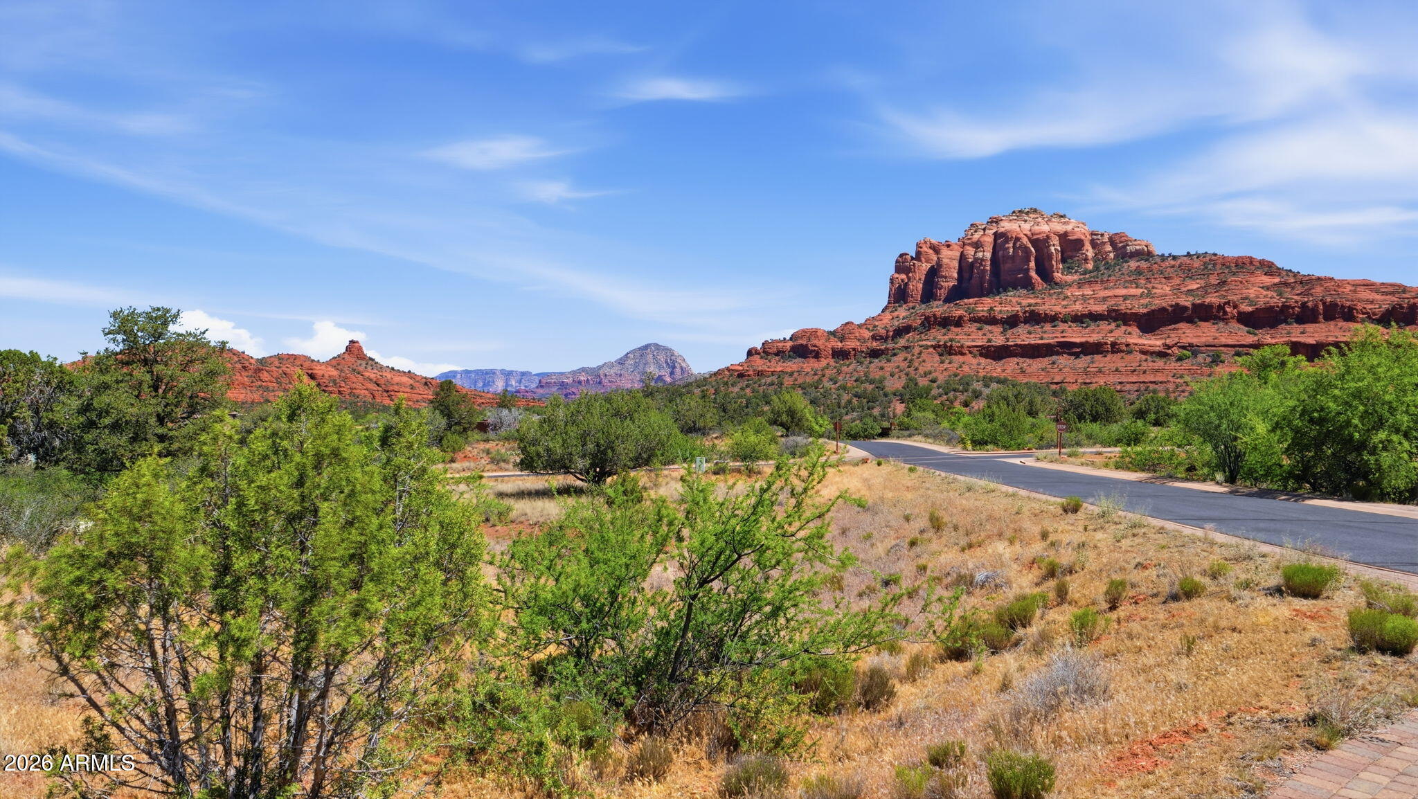 145 Little Park Road, Unit 10 Sedona, AZ 86351 - Photo 3 of 19 a view of a city with a mountain in the background