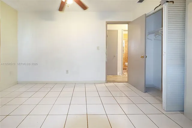 a view of an empty room and window