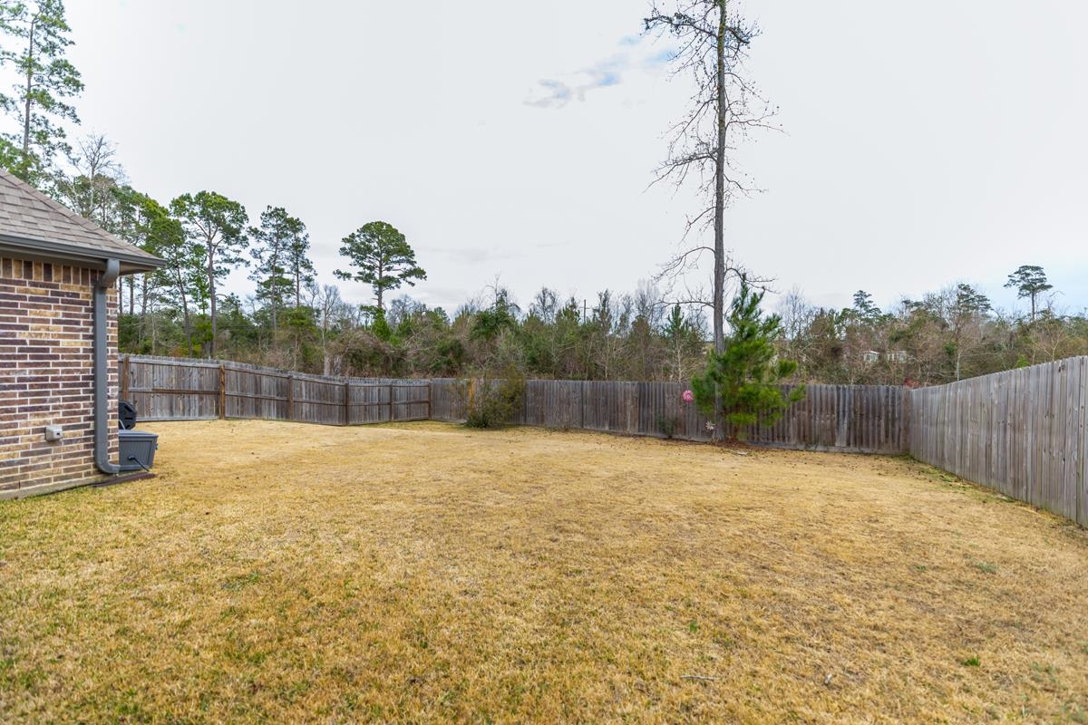 314 Long Leaf Street Silsbee, TX 77656 - Photo 28 of 31 a swimming pool with an outdoor space