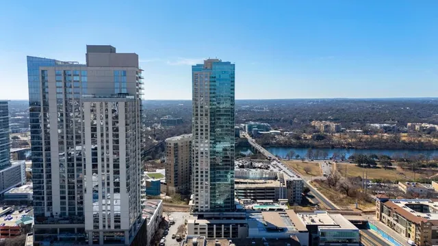 a view of a hallway with washer and dryer