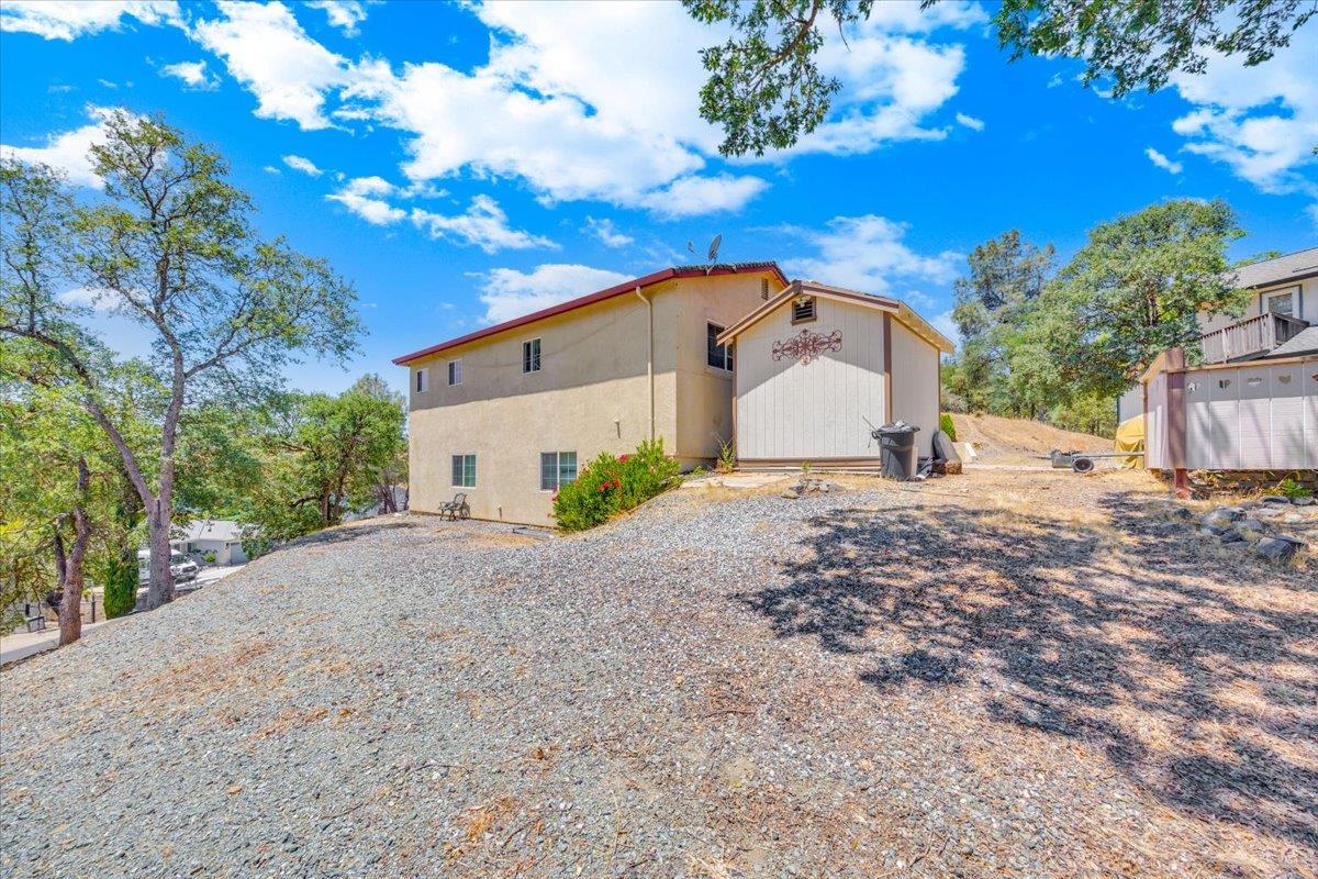 411 Sunrise Road Copperopolis, CA 95228 - Photo 50 of 76 View from the other side of the home from the empty adjacent lot next door.