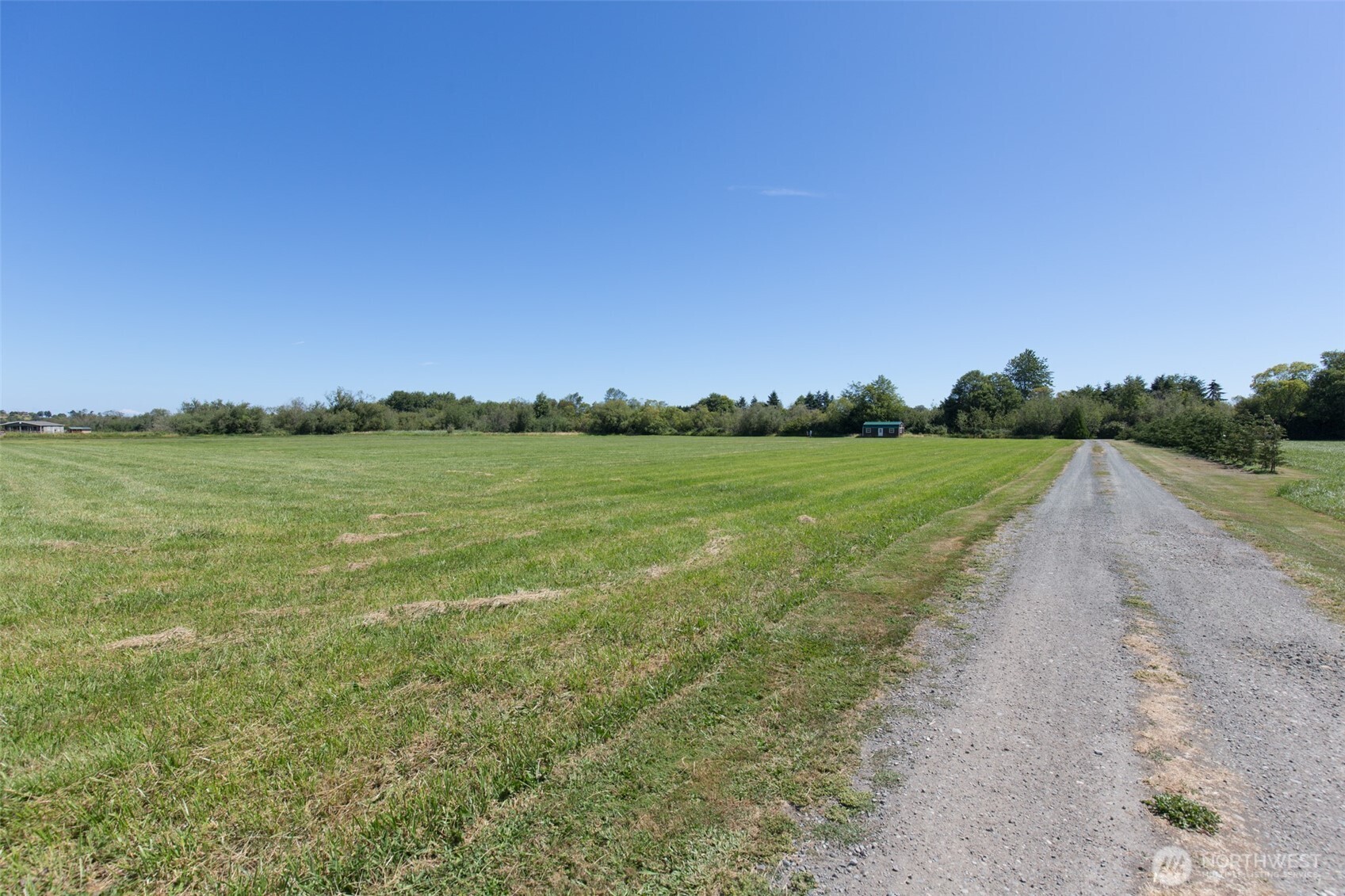 0 Buttercup Lane Sequim, WA 98382 - Photo 29 of 32 a view of a lake with a big yard