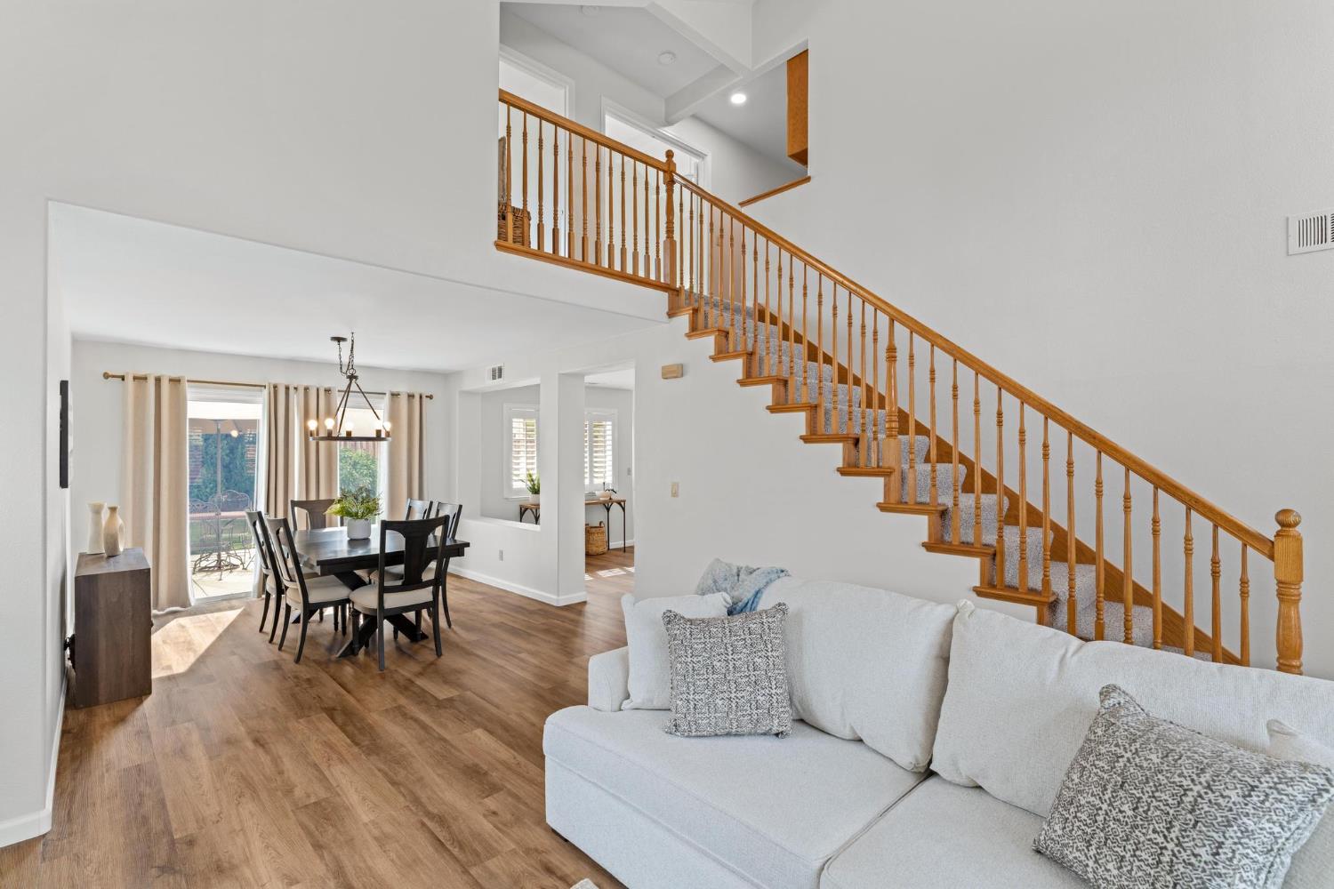 716 Hemmingway Court Tracy, CA 95376 - Photo 19 of 41 a living room with furniture and wooden floor