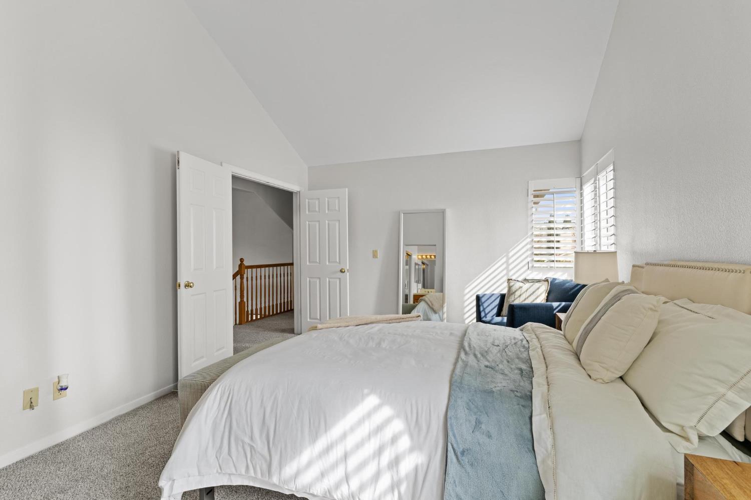 716 Hemmingway Court Tracy, CA 95376 - Photo 21 of 41 a bedroom with a bed and a couch