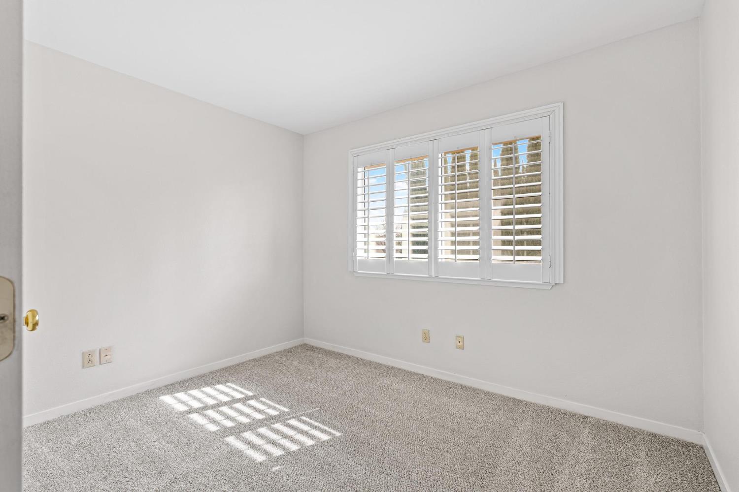 716 Hemmingway Court Tracy, CA 95376 - Photo 25 of 41 a view of an empty room with a window