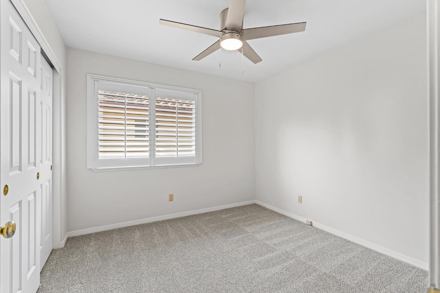 716 Hemmingway Court Tracy, CA 95376 - Photo 27 of 41 a view of an empty room with a window