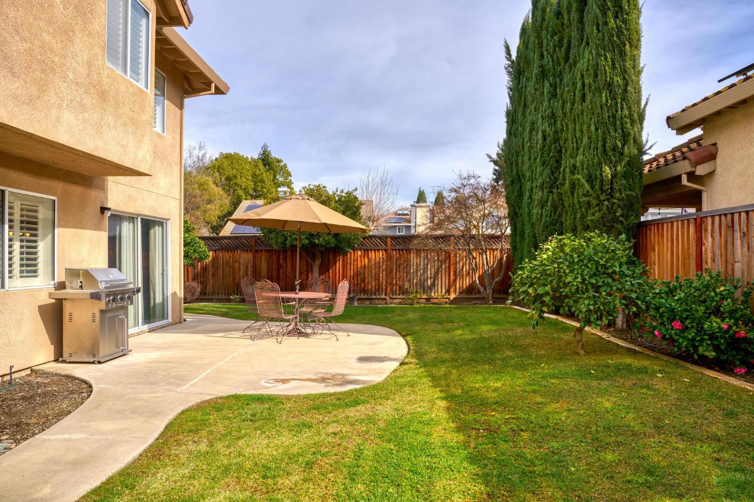 716 Hemmingway Court Tracy, CA 95376 - Photo 34 of 41 a view of a backyard with sitting area