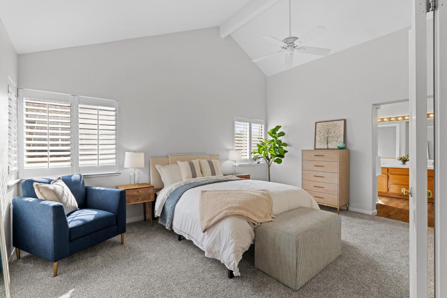 716 Hemmingway Court Tracy, CA 95376 - Photo 6 of 41 a spacious bedroom with a bed couches and a couch