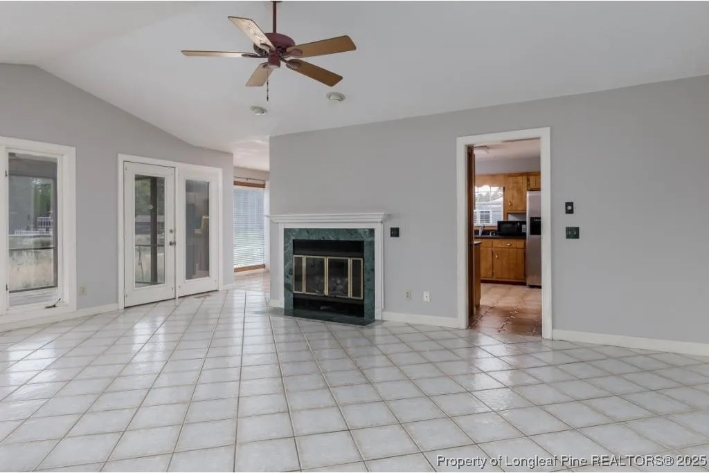 692 Cedar Point Vass, NC 28394 - Photo 11 of 46 a view of an empty room with a fireplace