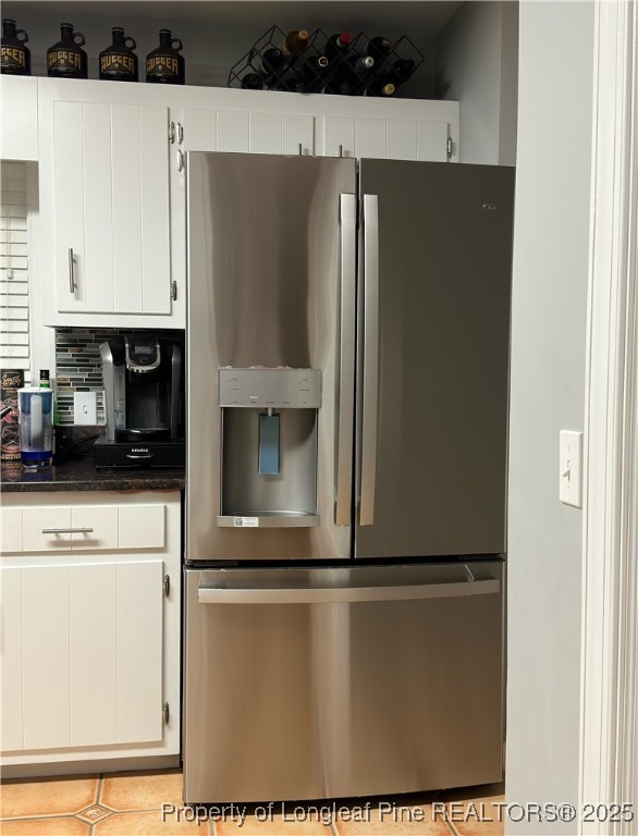 692 Cedar Point Vass, NC 28394 - Photo 14 of 46 a refrigerator freezer sitting inside of a kitchen