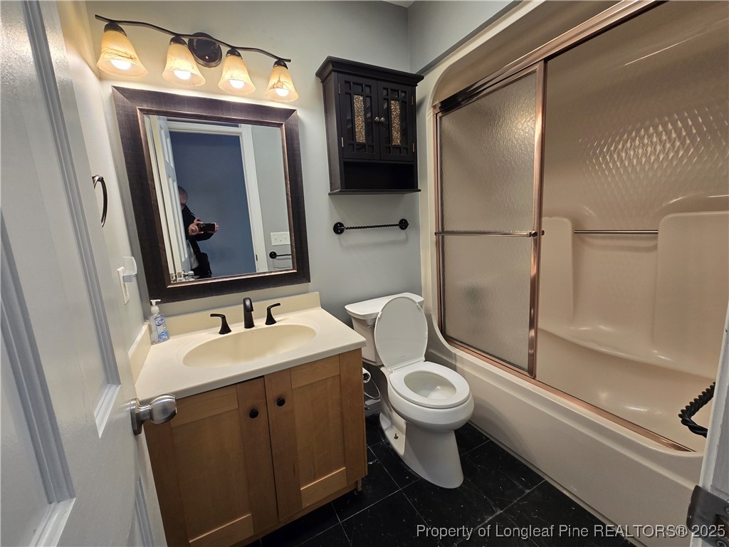 692 Cedar Point Vass, NC 28394 - Photo 32 of 46 a bathroom with a toilet sink and shower