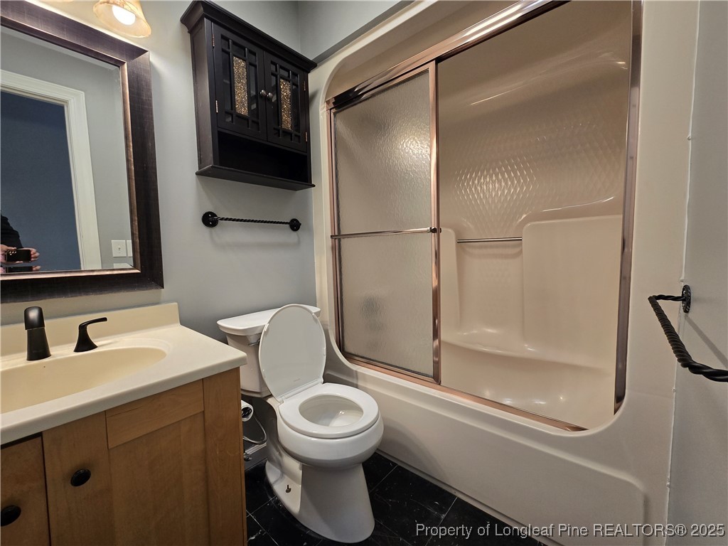 692 Cedar Point Vass, NC 28394 - Photo 33 of 46 a bathroom with a toilet sink and shower