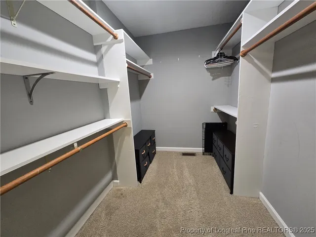 a bathroom with a toilet a sink and bathtub