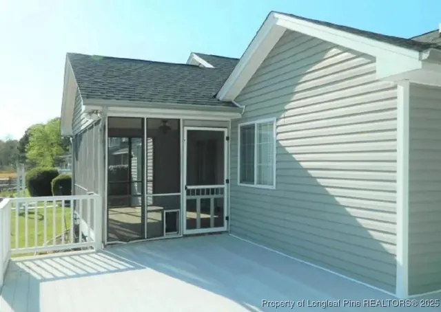 a view of a house with entrance gate